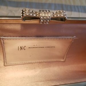 Glitter clutch with bow